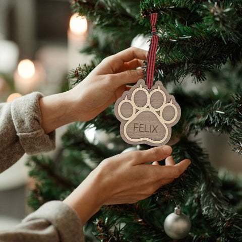 Sweet and Personalized Cat Paw Ornament - Adorn your tree with this delightful ornament featuring a cute cat paw print. Customize it with your cat's name for a unique touch, celebrating the feline charm that brightens your holiday season