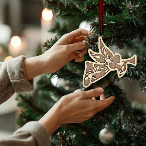 Angel Cradling Trumpet Ornament