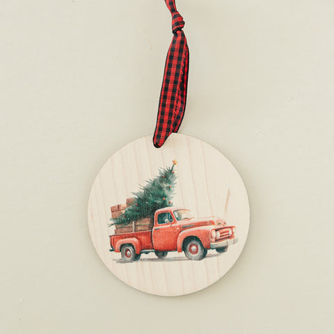 Charming Christmas tree truck ornament, capturing the festive spirit of the season. Adorned with a nostalgic truck hauling a beautifully decorated tree, this delightful ornament adds a touch of holiday magic to your decorations.