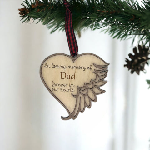 Customized memorial ornament, a touching tribute to Dad. Crafted with care, this personalized keepsake captures the essence of his love and enduring presence, offering a meaningful remembrance during the holiday season.