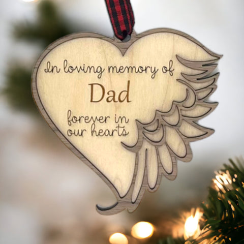 Customized memorial ornament, a touching tribute to Dad. Crafted with care, this personalized keepsake captures the essence of his love and enduring presence, offering a meaningful remembrance during the holiday season.