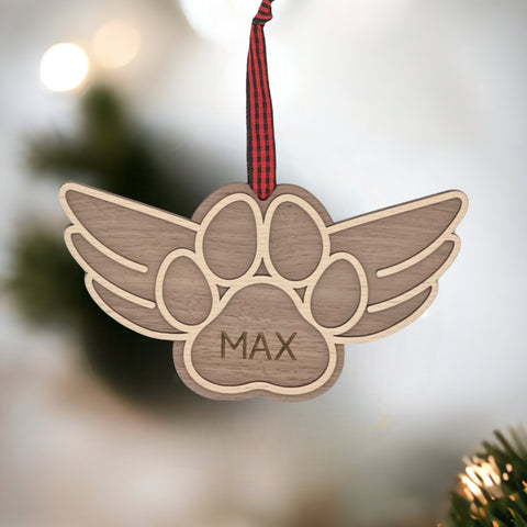 Gentle tribute with the Dog Paw Personalized Memorial Ornament - A loving remembrance for your cherished canine friend. Personalize with your dog's name, creating a special ornament to honor their memory during the holiday season.