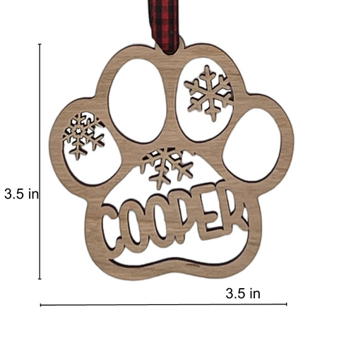 Capture your furry friend's spirit with the Dog Paw Print Personalized Ornament. Add a custom touch by imprinting your dog's name, creating a heartfelt keepsake for your holiday celebrations