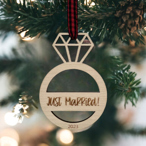 Just Married Ornament - Celebrate the newlywed bliss with this charming decoration, featuring a whimsical design. A perfect addition to your holiday decor, capturing the joy and love of the recent union.