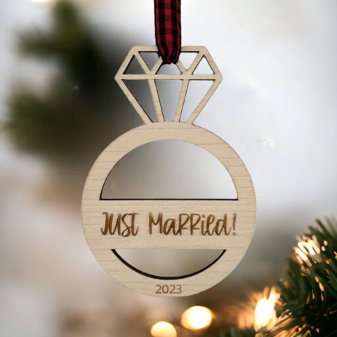 Just Married Ornament - Celebrate the newlywed bliss with this charming decoration, featuring a whimsical design. A perfect addition to your holiday decor, capturing the joy and love of the recent union.