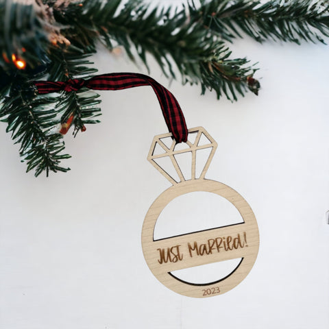 Just Married Ornament - Celebrate the newlywed bliss with this charming decoration, featuring a whimsical design. A perfect addition to your holiday decor, capturing the joy and love of the recent union.