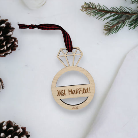 Just Married Ornament - Celebrate the newlywed bliss with this charming decoration, featuring a whimsical design. A perfect addition to your holiday decor, capturing the joy and love of the recent union.