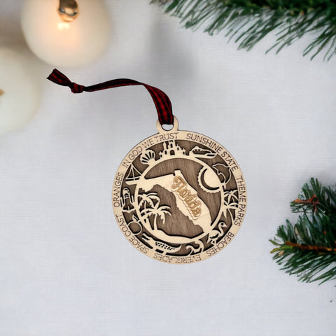 Capture the Sunshine State's magic with our Florida State Highlights Ornament – a shimmering keepsake adorned with iconic symbols. From pristine beaches to vibrant cities, this ornament beautifully encapsulates the essence of Florida. Bring home a touch of sunshine and memories with this exquisite piece for your holiday decor.