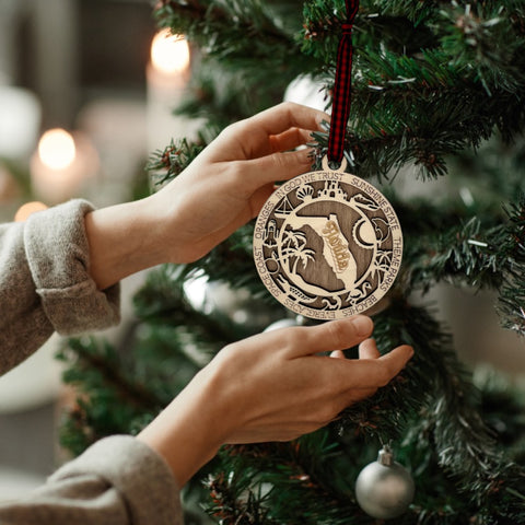 Capture the Sunshine State's magic with our Florida State Highlights Ornament – a shimmering keepsake adorned with iconic symbols. From pristine beaches to vibrant cities, this ornament beautifully encapsulates the essence of Florida. Bring home a touch of sunshine and memories with this exquisite piece for your holiday decor.