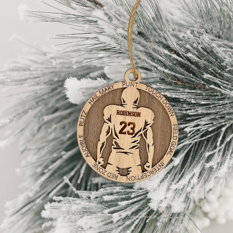 Score a touchdown in holiday style with our Personalized Football Sports Ornament! Tailor-made for football fanatics, this festive keepsake adds a personalized touch to your tree. Customize now for a unique ornament that celebrates the love of the game.