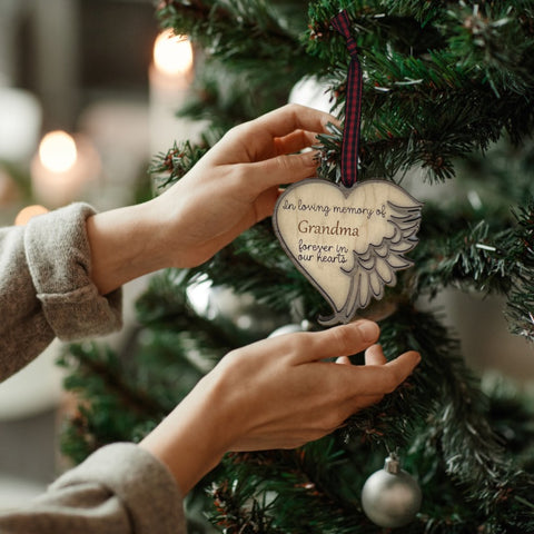 Elegant memorial ornament crafted with care, featuring a personalized touch to honor Grandma's memory. A heartfelt tribute capturing her love and warmth, a cherished keepsake for the holiday season.