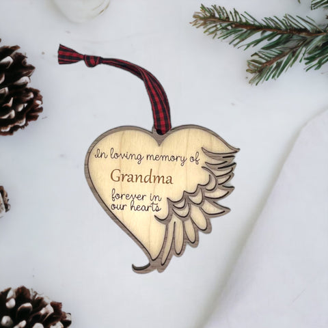 Elegant memorial ornament crafted with care, featuring a personalized touch to honor Grandma's memory. A heartfelt tribute capturing her love and warmth, a cherished keepsake for the holiday season.