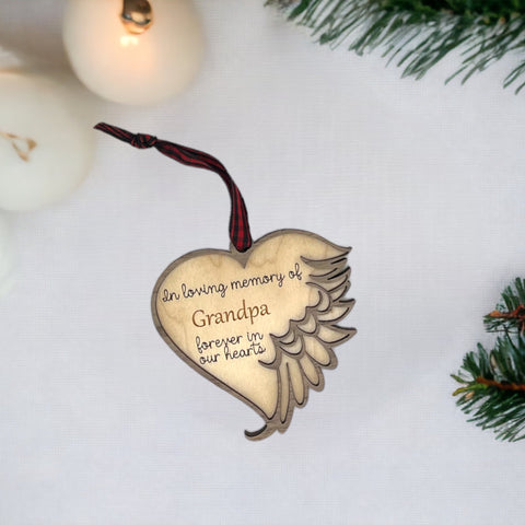 Thoughtfully crafted personalized memorial ornament in remembrance of Grandpa. A special tribute capturing his enduring spirit and love, creating a cherished keepsake to honor his memory during the holiday season.