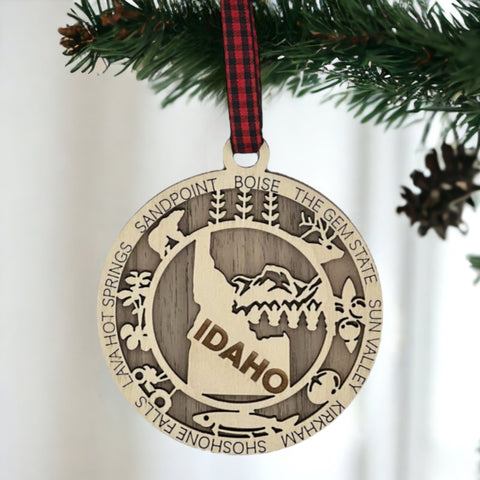 Adorn your tree with the charm of Idaho! Our Idaho State Highlights Ornament showcases the beauty of the Gem State. From rugged mountains to scenic landscapes, celebrate the spirit of Idaho in every detail.