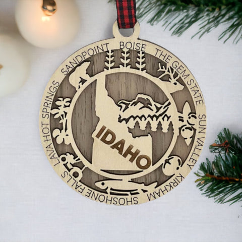 Adorn your tree with the charm of Idaho! Our Idaho State Highlights Ornament showcases the beauty of the Gem State. From rugged mountains to scenic landscapes, celebrate the spirit of Idaho in every detail.