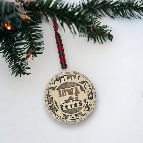 Sprinkle some Hawkeye magic on your tree! Our Iowa State Highlights Ornament is a festive nod to the heartland's beauty. From rolling cornfields to iconic landmarks, celebrate the charm of the Hawkeye State this holiday season. 