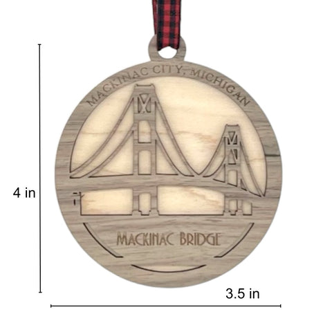 Iconic Mackinac Bridge ornament, featuring the breathtaking steel spans connecting Michigan's Upper and Lower Peninsulas. A majestic addition to your holiday decor, capturing the spirit of this engineering marvel and the beauty of the Great Lakes region.