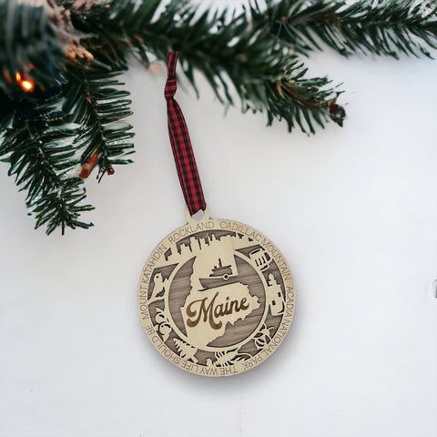 Elevate your holiday with a touch of Maine magic! Introducing our Maine State Highlights Ornament, a coastal-inspired masterpiece. From lighthouses to pine-covered landscapes, celebrate the beauty of the Pine Tree State in every detail. 