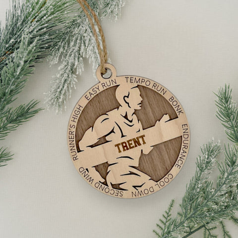 Race into the holidays with our Personalized Male Cross Country Ornament! Tailored for running enthusiasts, this custom keepsake adds a personal touch to your tree. Celebrate the cross country runner in your life with this spirited ornament. Customize now for a winning stride in holiday decor – order your Personalized Male Cross Country Ornament today!