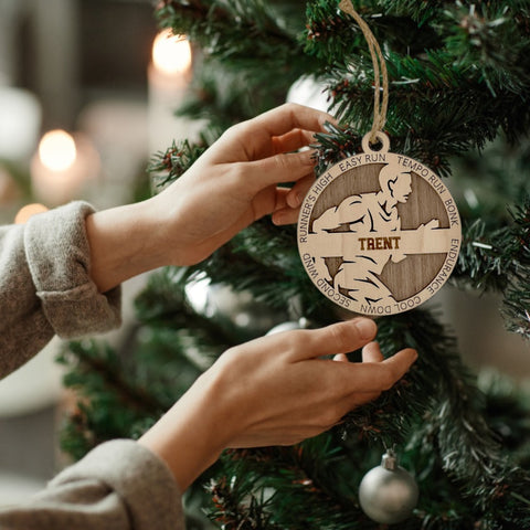 Race into the holidays with our Personalized Male Cross Country Ornament! Tailored for running enthusiasts, this custom keepsake adds a personal touch to your tree. Celebrate the cross country runner in your life with this spirited ornament. Customize now for a winning stride in holiday decor – order your Personalized Male Cross Country Ornament today!