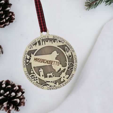 Embrace the charm of the Bay State! Our Massachusetts State Highlights Ornament brings iconic landmarks and historic elegance to your holiday decor. Celebrate the season with a touch of Massachusetts magic.