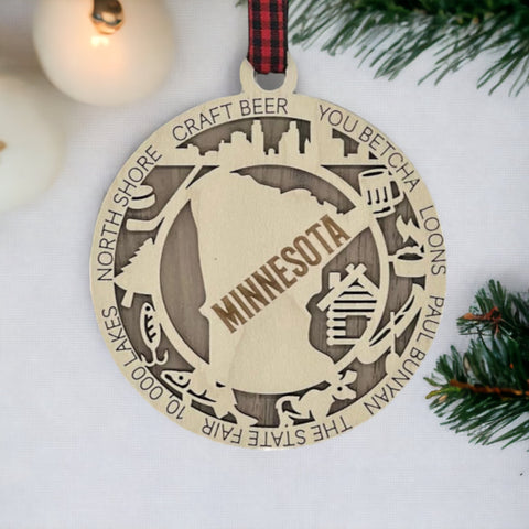 Unwrap the spirit of Minnesota with our State Highlights Ornament!  Elevate your holiday decor with Gopher pride and iconic moments. Immerse yourself in the charm of the North Star State!