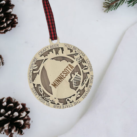 Unwrap the spirit of Minnesota with our State Highlights Ornament!  Elevate your holiday decor with Gopher pride and iconic moments. Immerse yourself in the charm of the North Star State!