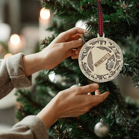 Unwrap the spirit of Minnesota with our State Highlights Ornament!  Elevate your holiday decor with Gopher pride and iconic moments. Immerse yourself in the charm of the North Star State!