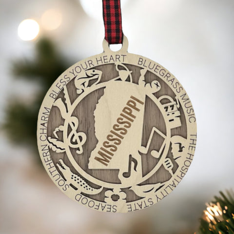Dazzle your tree with Mississippi magic! Our Highlights Ornament captures the soul of the Magnolia State in every detail. Elevate your holiday with Southern charm and iconic moments.