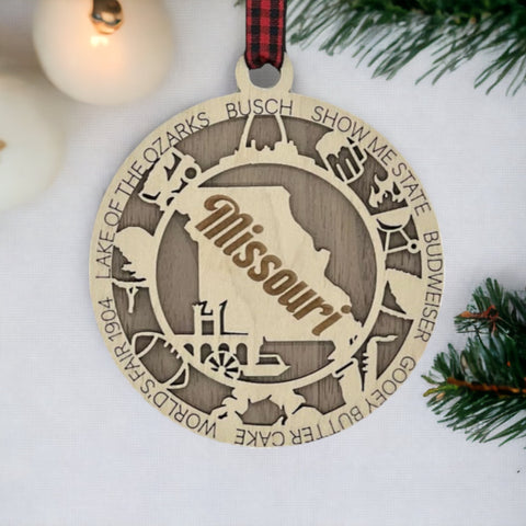 Deck the halls with a touch of Show-Me State flair!  Our Missouri Highlights Ornament is a festive must-have, showcasing iconic moments and timeless charm. Add a dash of Missouri magic to your holiday! 