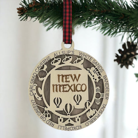 Unwrap the spirit of the Land of Enchantment! Introducing the New Mexico State Highlights Ornament – a touch of southwestern magic for your holiday decor. Elevate your festivities with the vibrant colors and culture of the Land of Enchantment!