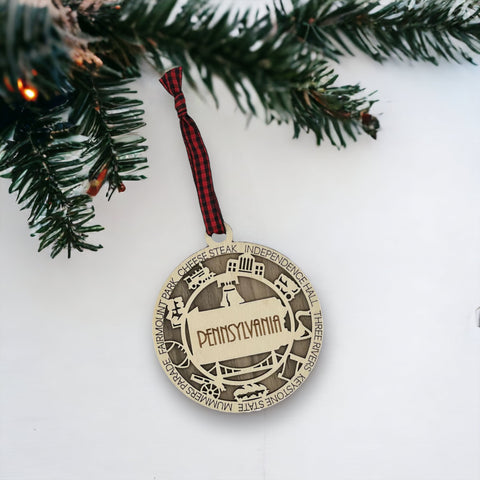 Keystone State charisma for your tree! Introducing the Pennsylvania State Highlights Ornament—a miniature masterpiece celebrating history and hometown pride. Elevate your holiday decor with a touch of Pennsylvania charm.