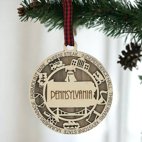 Keystone State charisma for your tree! Introducing the Pennsylvania State Highlights Ornament—a miniature masterpiece celebrating history and hometown pride. Elevate your holiday decor with a touch of Pennsylvania charm.