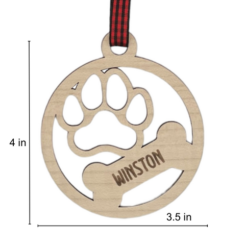 Capture the pawfect moments with our Personalized Dog Paw Bone Ornament. Add a unique touch to your holiday decor by customizing this charming keepsake with your furry friend's name. Celebrate the joy and love your dog brings to your life with this delightful ornament, a heartwarming addition to your festive traditions.