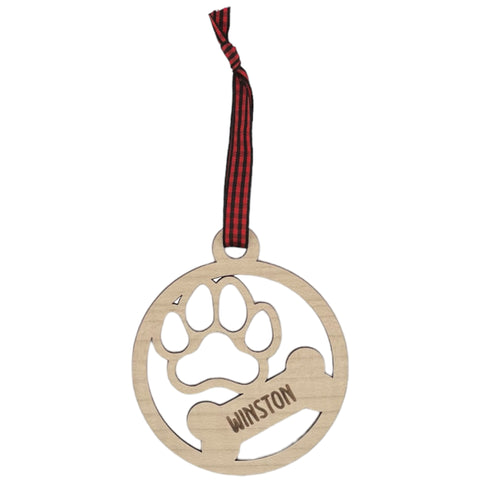 Capture the pawfect moments with our Personalized Dog Paw Bone Ornament. Add a unique touch to your holiday decor by customizing this charming keepsake with your furry friend's name. Celebrate the joy and love your dog brings to your life with this delightful ornament, a heartwarming addition to your festive traditions.