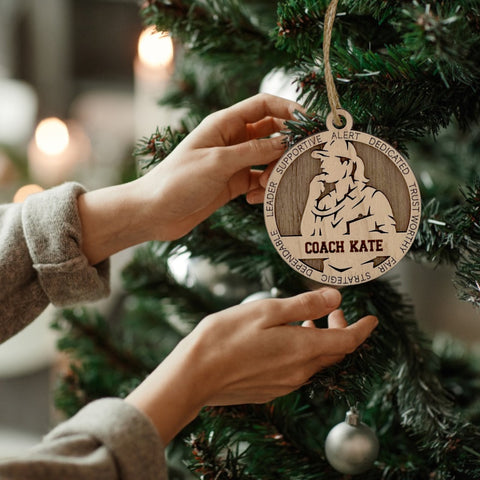 Gift your coach the recognition they deserve with our Personalized Female Coach Ornament! Crafted for sports enthusiasts, this custom keepsake adds a personal touch to your tree. Celebrate the guidance and leadership of your favorite coach with this thoughtful ornament. Customize now for a winning touch in holiday decor – order your Personalized Female Coach Ornament today!