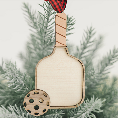 Personalized Pickleball Paddle Ornament, a sporty and unique addition to your holiday decor. Customize with a name or special message, celebrating the joy of pickleball and creating a cherished keepsake for enthusiasts during the festive season.
