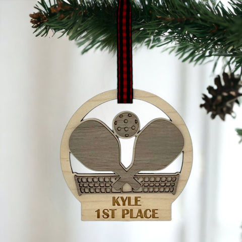 Personalized Pickleball Paddle Ornament, a sporty and unique addition to your holiday decor. Customize with a name or special message, celebrating the joy of pickleball and creating a cherished keepsake for enthusiasts during the festive season.