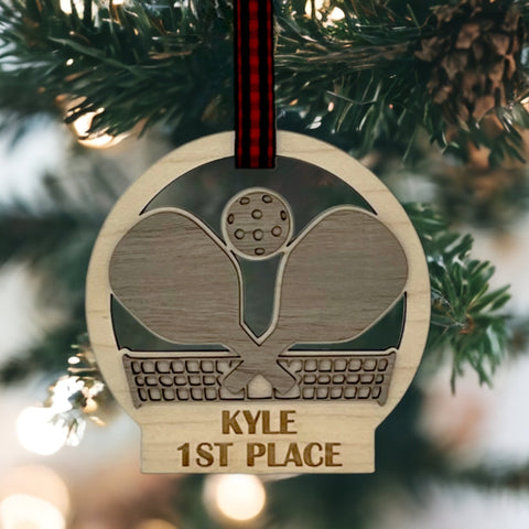 Personalized Pickleball Paddle Ornament, a sporty and unique addition to your holiday decor. Customize with a name or special message, celebrating the joy of pickleball and creating a cherished keepsake for enthusiasts during the festive season.