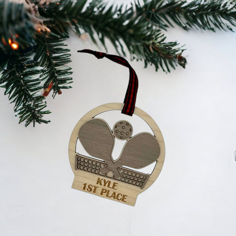 Personalized Pickleball Paddle Ornament, a sporty and unique addition to your holiday decor. Customize with a name or special message, celebrating the joy of pickleball and creating a cherished keepsake for enthusiasts during the festive season.