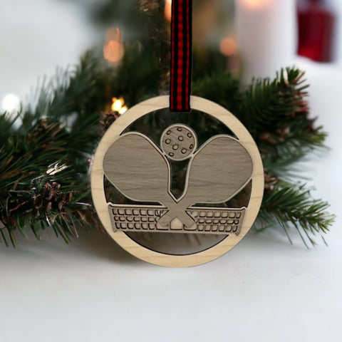 Personalized Pickleball Paddle Ornament, a sporty and unique addition to your holiday decor. Customize with a name or special message, celebrating the joy of pickleball and creating a cherished keepsake for enthusiasts during the festive season.