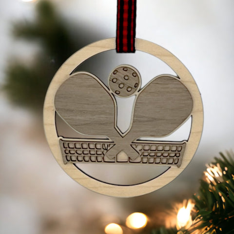 Personalized Pickleball Paddle Ornament, a sporty and unique addition to your holiday decor. Customize with a name or special message, celebrating the joy of pickleball and creating a cherished keepsake for enthusiasts during the festive season.