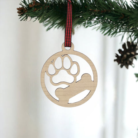 Capture the pawfect moments with our Personalized Dog Paw Bone Ornament. Add a unique touch to your holiday decor by customizing this charming keepsake with your furry friend's name. Celebrate the joy and love your dog brings to your life with this delightful ornament, a heartwarming addition to your festive traditions.