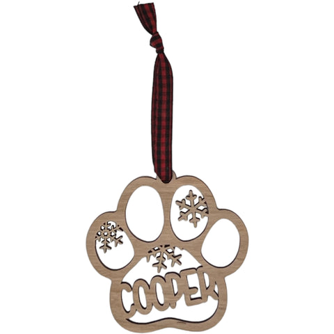 Capture your furry friend's spirit with the Dog Paw Print Personalized Ornament. Add a custom touch by imprinting your dog's name, creating a heartfelt keepsake for your holiday celebrations