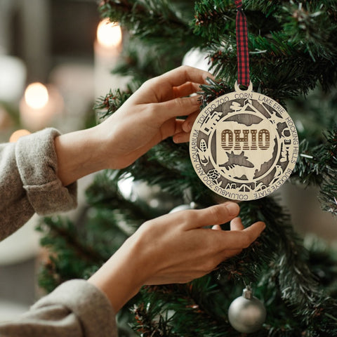 Ohio pride, ornament-sized! Introducing the Ohio State Highlights Ornament—a mini tribute to the heart of it all. Elevate your holiday decor with a touch of Buckeye State charm. Celebrate the season with a dash of Ohio spirit!