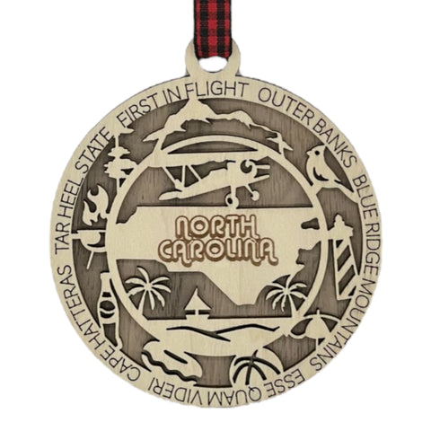Dazzle your tree with Southern charm! Introducing the North Carolina State Highlights Ornament – a delightful keepsake showcasing the beauty of the Tar Heel State. 