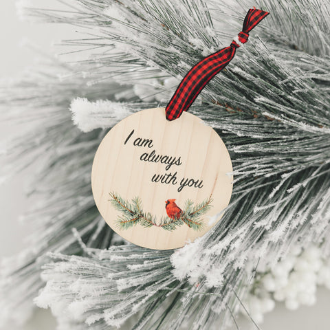 Beautiful red cardinal memorial ornament, symbolizing a loved one's presence. A poignant tribute adorned with a red bird, capturing the spirit and memory of a cherished individual, bringing comfort and warmth during the holiday season.