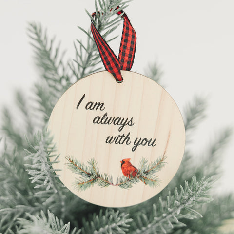 Beautiful red cardinal memorial ornament, symbolizing a loved one's presence. A poignant tribute adorned with a red bird, capturing the spirit and memory of a cherished individual, bringing comfort and warmth during the holiday season.