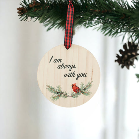 Beautiful red cardinal memorial ornament, symbolizing a loved one's presence. A poignant tribute adorned with a red bird, capturing the spirit and memory of a cherished individual, bringing comfort and warmth during the holiday season.