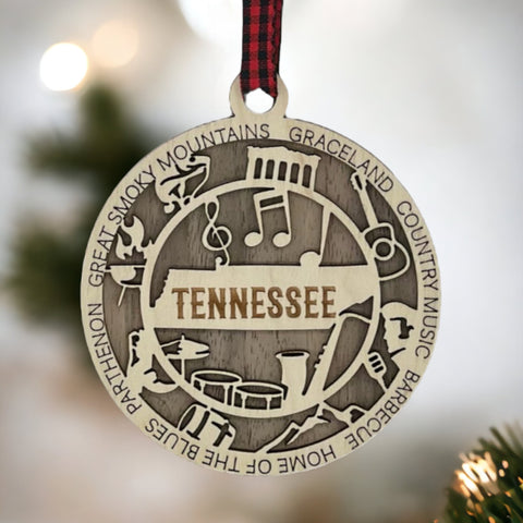 Celebrate the Volunteer State with our Tennessee State Highlights Ornament! A miniature masterpiece capturing the heart and soul of Tennessee's charm. Elevate your holiday decor with a touch of southern warmth. 